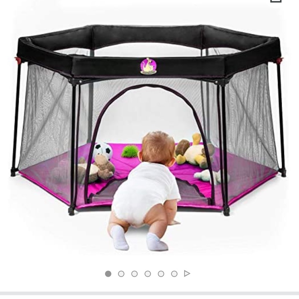 Portable baby play pen.